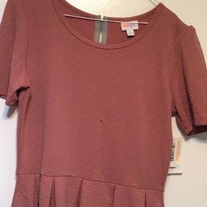 LuLaRoe pink salmon colored dress.